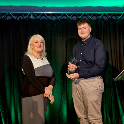 The 4Uth awards winner for 2023 being presented his award by Councillor Tracy Taylor