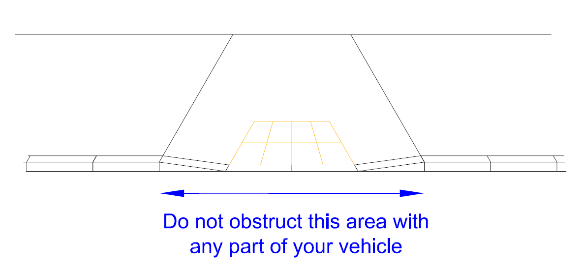 Dropped kerb indicating area you must not obstruct
