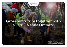 Two children planting a tree together. The text "Grow our future together with a free Veolia Orchard" is written across the middle of the picture in a white font