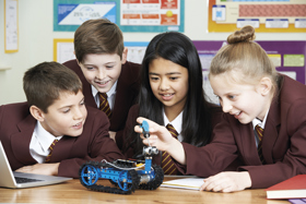 Image: Secondary school children working on group project