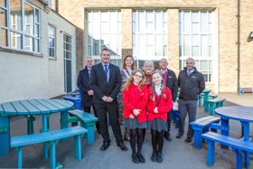 Councillor Tracey Taylor, Cabinet Member for Children and Families (centre) pictured at Jesse Gray with head teacher Chris Belton, school governor, Arc representatives and pupils Bria Coates, 10, and