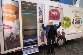 Image of Councillor Tracey Taylor stood outside mobile youth centre