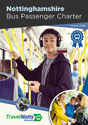 Young man listening to music on a bus