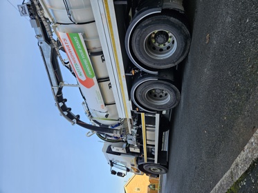 Shot of a drainage tanker in a street with the Notts Highways logo