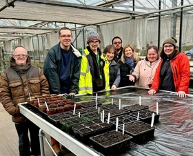 Members of the RHS Chelsea Flower Show garden team at Brooke Farm