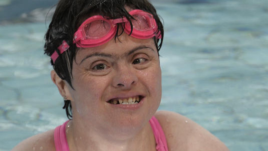 Person taking part in a swimming activity.