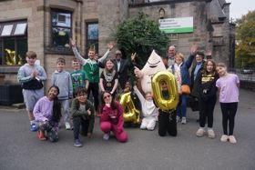 Councillor Rory Green, Councillor John Semens, Councillor Christopher Adegoke, Councillor Dawn Justice and Councillor Janette Barlow with children from Haddon Primary School and the Notts Outdoors mascot, Bracken the hedgehog, celebrating the 40th anniversary of Notts Outdoors at the St Michaels centre.