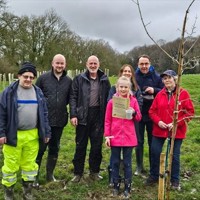 People in a Nottinghamshire woodland who have been tree planting. Featured from left to right are: Ken Hamilton, Cllr Scott Carlton, Nick Tucker, Ella, her mum, her dad, Madeleine Fletcher.