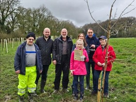 People in a Nottinghamshire woodland who have been tree planting. Featured from left to right are: Ken Hamilton, Cllr Scott Carlton, Nick Tucker, Ella, her mum, her dad, Madeleine Fletcher.