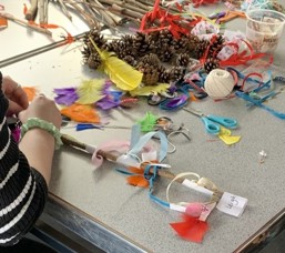 A photo of the arts and crafts table from the activity day.